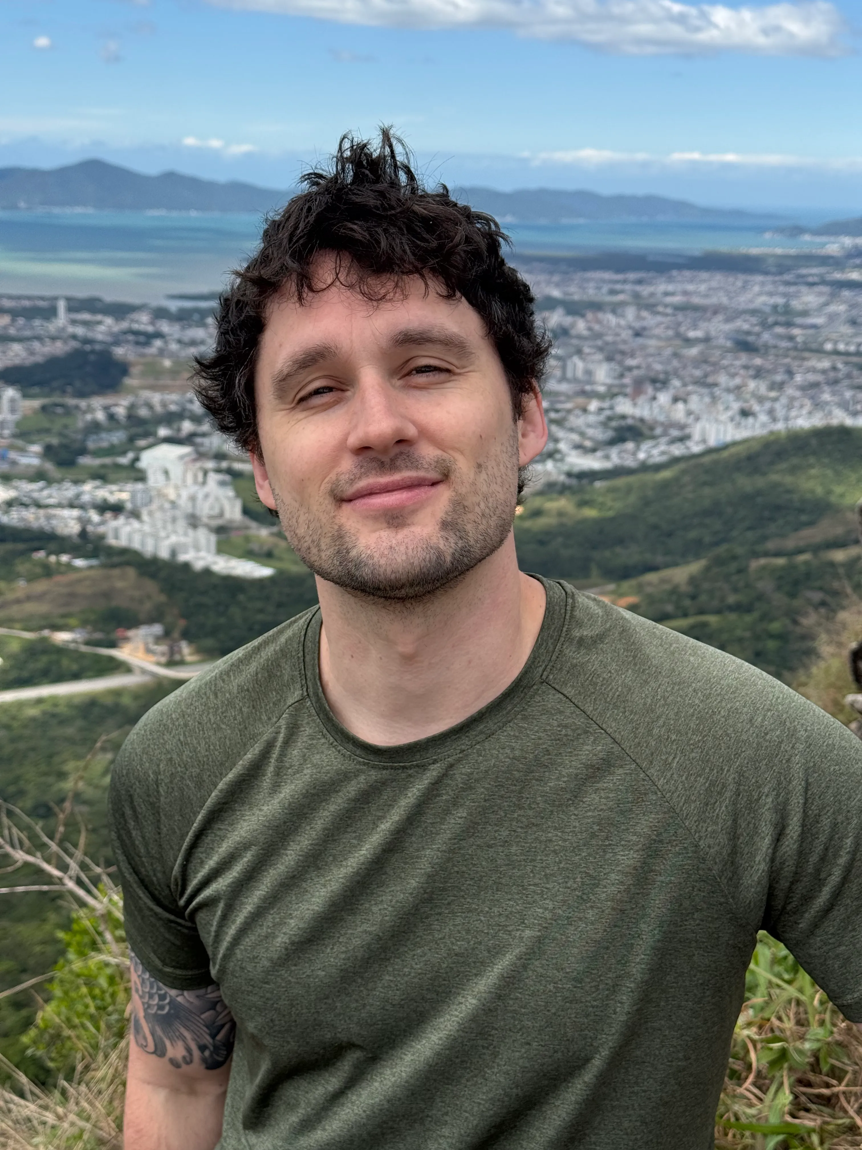 Portrait of Noah Spott outdoors at an overlook
